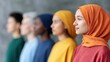 © 69 - Profile view of diverse people standing in a row looking forward with focus and determination, showcasing cultural diversity and unity in contemporary setting