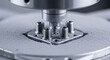 © Leo - Intricate precision machinery works on tiny threaded metal components in a close-up industrial manufacturing scene