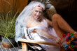 © kavardakova - attractive sexy homosexual man posing in bride's dress