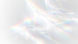 © OLEKSANDR - Refraction crystal rainbow prism sparkle light with transparent optical holographic overlay glowing flare and abstract futuristic background design.