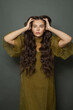 © millaf (Nemchinova) - Glorious woman hair. Beautiful model with long curly hairstyle posing