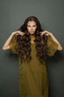 © millaf (Nemchinova) - Beautiful brunette woman with long healthy hair on dark background