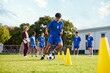 © Rido - Football drill training at high school campus