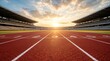 © Gophotograph - An empty athletics running track in a stadium during a beautiful sunset.