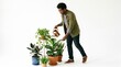 © Lucas - Person watering houseplants with watering can home care isolated on white background domestic lifestyle gardening concept.