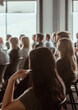 © dreamalittledream - Diverse corporate training conference seminar presentation audience in modern office