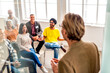 © Rawpixel.com - Diverse group attending engaging seminar