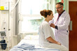 © Rawpixel.com - Doctor examines patient in hospital