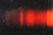 © PT-studio - retro film overlay effect with scratch dust and red light leaks,retro grain noisy film distressed light leak flare on black background,black and white abstract background,Abstract old film texture