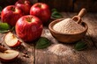 © Holo Frame - Vibrant red apples with fine apple fiber powder on aged wood table backdrop