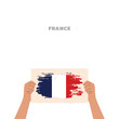 © Artoniumw - hands holding france flag illustration