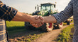 © graphicview35 - Two farmers shaking hands in front of a tractor on a farm