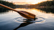 © Sekai - Polished rowing oar blade dipping into silky water surrounded by golden droplets and elegant motion