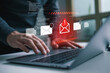 © maltez - Cybersecurity risk and phishing scam concept with data breach alert on screen