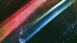 © Jinhao - Abstract worn‑textured backdrop with two broad parallel light streaks cutting through dark scratched surface, left streak blending red‑pink‑orange tones, right streak transitioning light green‑light