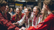 © valeo5 - Group of happy young people in traditional embroidered folk costumes holding hands laughing dancing in circle celebrating cultural festival event holiday gathered together indoors background