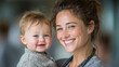 © Aghaa - Smiling Nurse Holding a Happy Baby in a Healthcare Setting