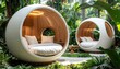 © Cuballe - Two uniquely designed, spherical sleeping pods are nestled within a lush, tropical garden setting, offering a tranquil and modern retreat.