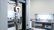 © Hypnotics 14 - Universal Testing Machine Performing Tensile Strength Test on Plastic Film in a Modern Research Laboratory