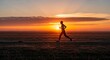 © Laut - Runner silhouette against sunset sky fitness and exercise concept