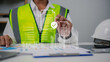 © Ao Zaa Studio - Engineer Using Digital Document Interface for Construction Project Management