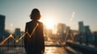© nameera_juwairiya - Business woman looking at financial graph on city skyline sunset