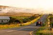 © Marc Romanelli - agricultural burning after harvest, tractor in foreground, western cape, South Africa