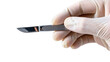 © Paula - Hand in glove holding scalpel with sharp blade