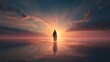 © baca - Silhouette of person walking on beach at sunset.
