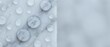 © Yuliia - Water droplets on a light gray waterproof fabric surface, showing hydrophobic effect with blurred background for copy space.
