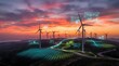 © Yuliia - Wind turbines generating renewable energy with digital grid overlay and data analytics display at dramatic sunset sky over rolling landscape.