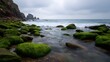 © Thares2020 - Dramatic coastal landscape featuring rugged sea stacks and cliffs under a moody overcast sky