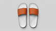 © RanggaDwi - A pair of brown leather slides lies on a plain gray surface indoors.