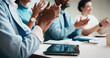 © peopleimages.com - Meeting, clapping hands and business people with tablet in office for funding approval and success. Applause, project management and celebration with team in boardroom for promotion and winning