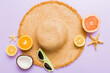 © sosiukin - Top view of various seashells placed near colorful fruit and stylish summer accessories on table background. Summer concept. Flat lay. Top view with copy space for text