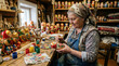 © ruangfootage - Mature Woman Painting Traditional Matryoshka Dolls in Workshop.