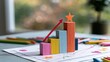 © Cinta - Colorful ascending bar chart with rising arrow and star topper