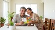 © ZHMPRO - Smiling father and daughter with handmade cards happy family celebrating occasion at home.