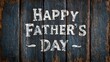 © Harry - Happy fathers day message painted in white letters on a rustic dark wooden board surface