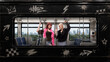 © Lustre Art Group  - Alternative couple seen through metro train window with black graffiti frame and street culture mood. Concept of underground fashion, urban romance, music promo, nightlife, and edgy campaign visuals.