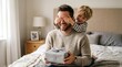 © Aklima - Heartwarming father's day moment little boy giving his dad a surprise gift