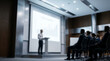 © Ccraftz - Professional businessman giving financial presentation to corporate audience , blured Silhouette