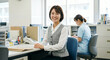 © Y Creative Stock - 病院のオフィスで働く笑顔の女性スタッフ 医療事務