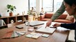 © tr144 - Two people discussing interior design materials.
