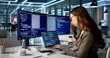 © Andrey Popov - Young Female Programmer Types Code On Desktop