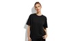 © khan - Young woman wearing oversized black t-shirt posing confidently against white background