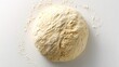 © Jam - Dough sits on a white surface, waiting to be shaped into a pizza in the kitchen