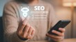 © Oripix Studio - Using an AI assistant for SEO optimisation and digital marketing strategy with high keyword ranking and content optimization on virtual screen