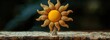 © Iurii - Vibrant sun brooch made from dyed hemp and eco glue displayed on cork bark