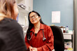© Austockphoto - healthcare professional consulting with a patient in a clinic